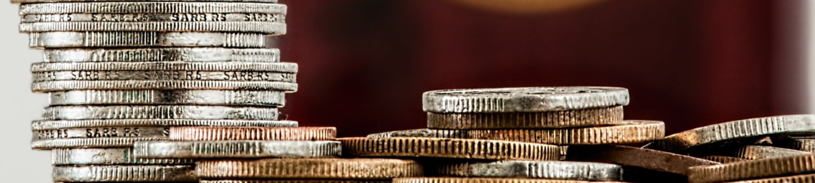 stock photo of stacks of silver and gold coins