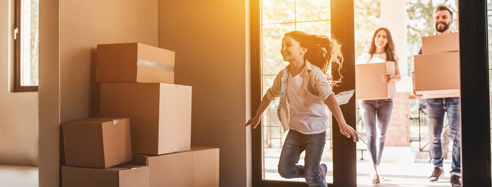 Young family moving in to their new home.