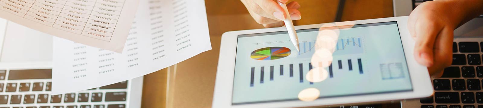 Tablet displaying financial graphs and information.